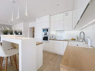 Kuchnia z wyspą w mieszkaniu na sprzedaż Łódź - Widzew