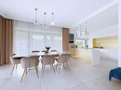 Luksusowa jadalnia ze stołem 8-osobowym i otwartą kuchnią z wyspą — Ostrów łódzkie