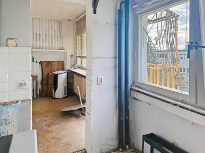 Kuchnia widok z drugiej strony w mieszkaniu na sprzedaż Łódź Górna