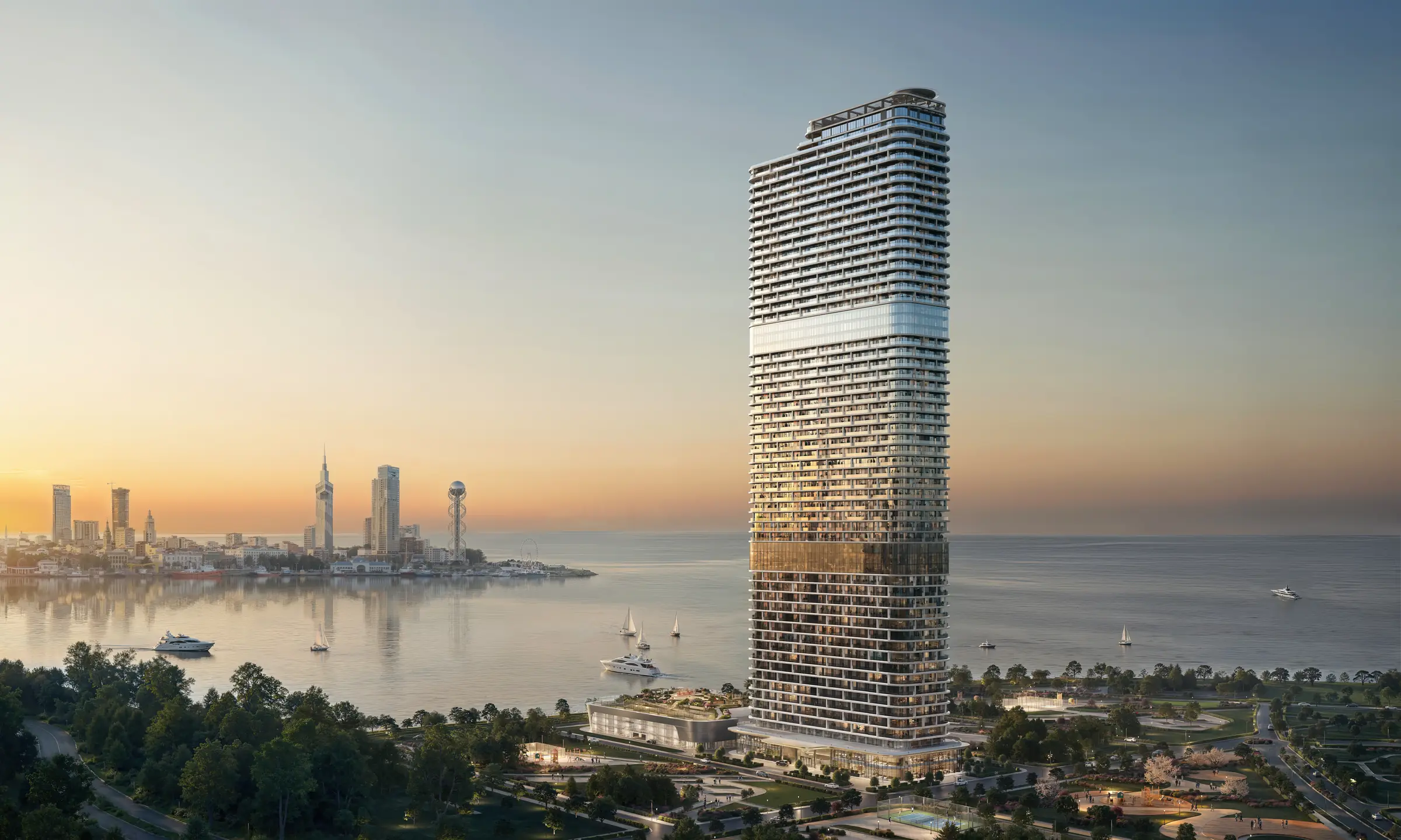 Wieża First o zachodzie słońca nad Morzem Czarnym, w tle panorama Batumi, wizualizacja dewelopera
