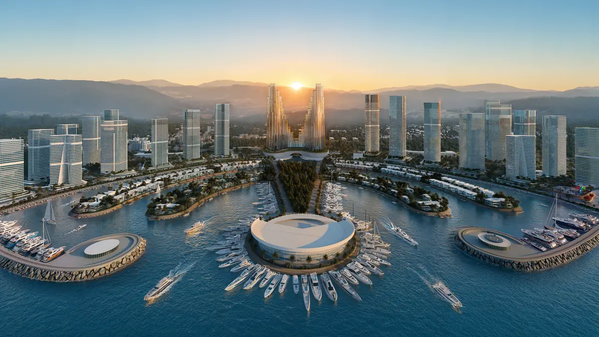 Ambassadori Island w Batumi z lotu ptaka o zachodzie słońca, marina i wieże